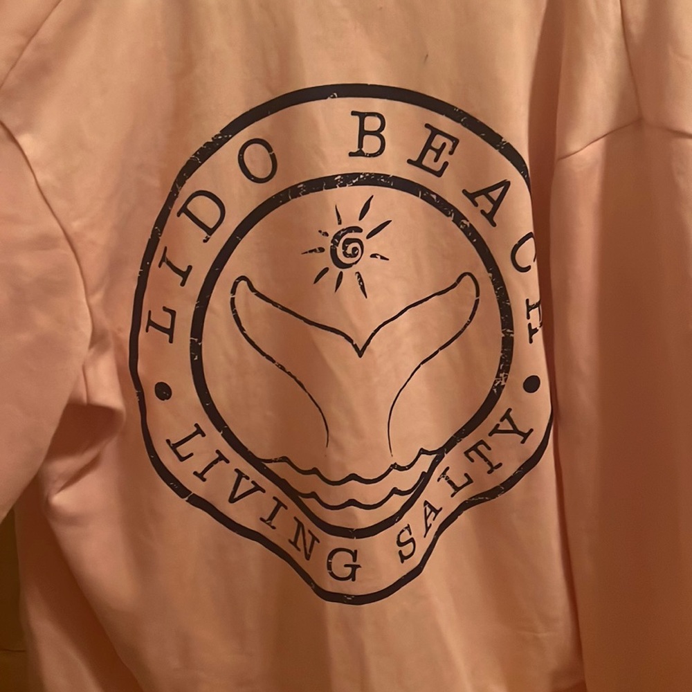 pink zip up sweatshirt